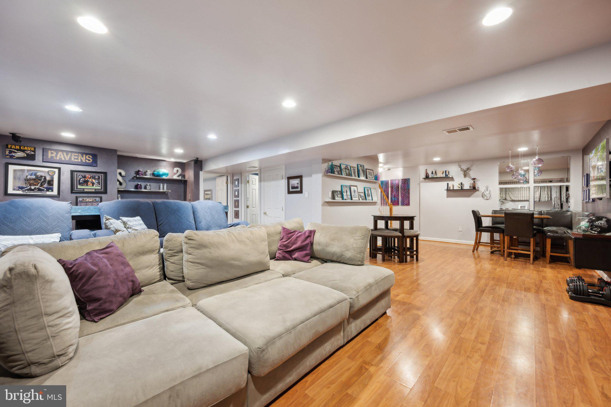 304 Thompson Dairy Way Rockville, MD 20850 - Photo 29 of 42 a living room with furniture and kitchen view
