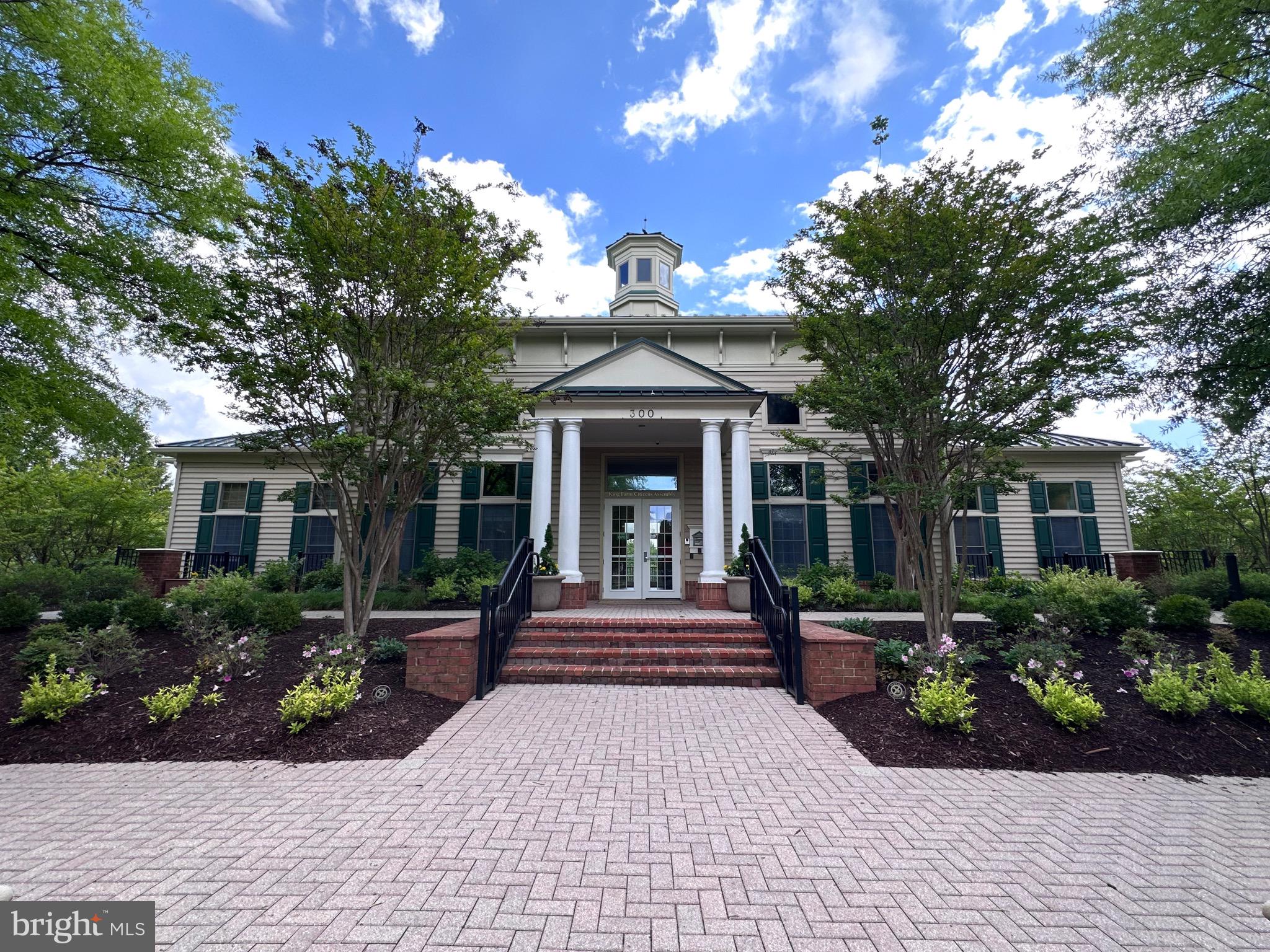304 Thompson Dairy Way Rockville, MD 20850 - Photo 40 of 42 a front view of a house with garden