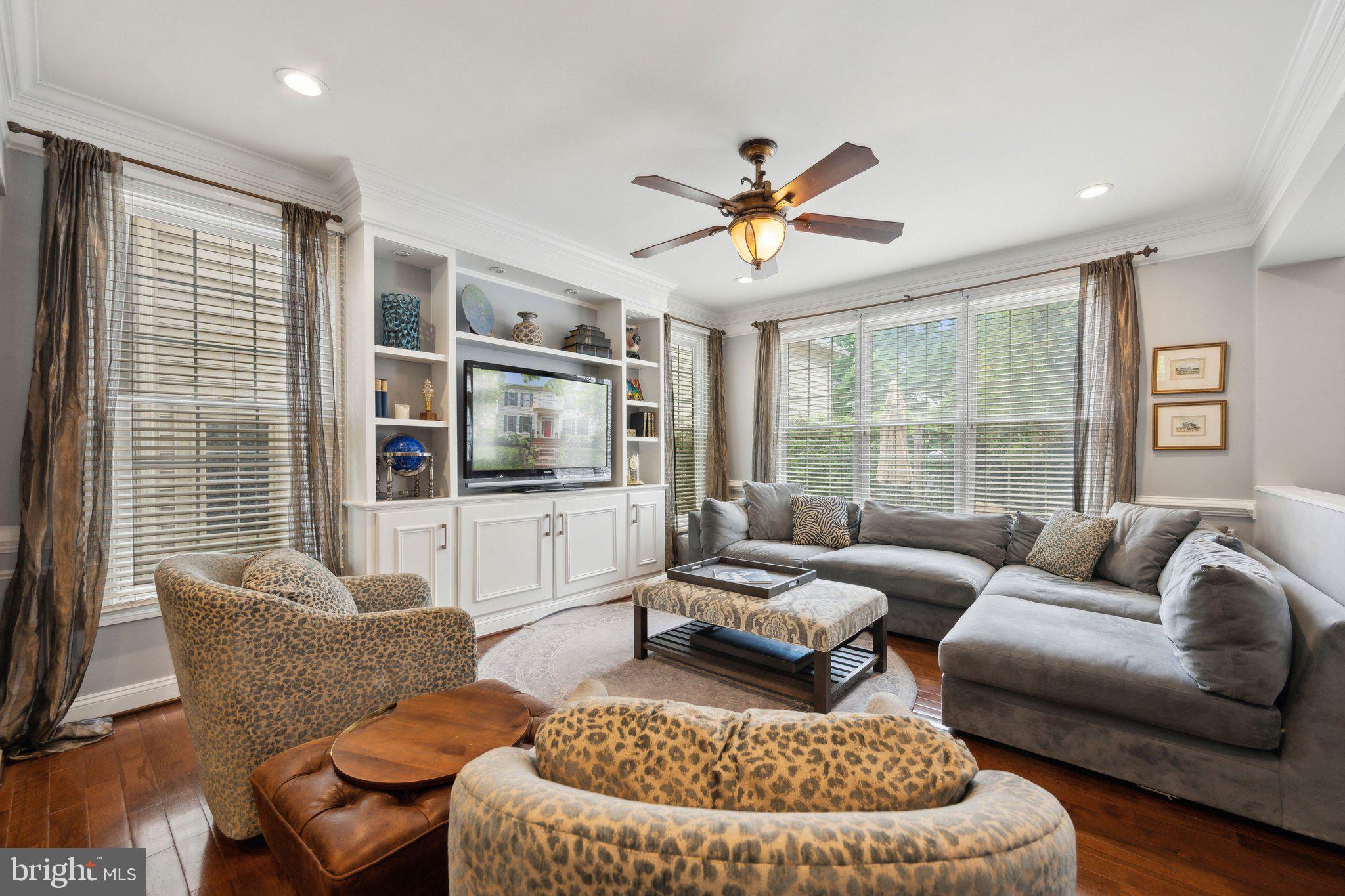 304 Thompson Dairy Way Rockville, MD 20850 - Photo 8 of 42 a living room with furniture and a large window