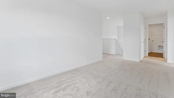 a bathroom with a shower and a sink