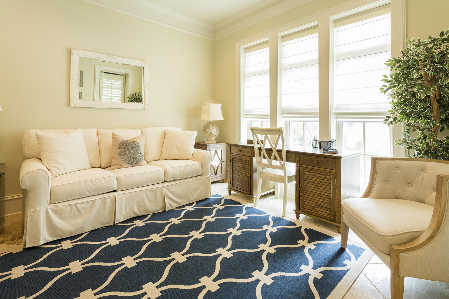 40 Pleasant Street Inlet Beach, FL 32461 - Photo 22 of 47 a living room with a black white checkered floor with a gaming machine and a rug