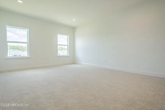 a view of swimming pool with outdoor seating