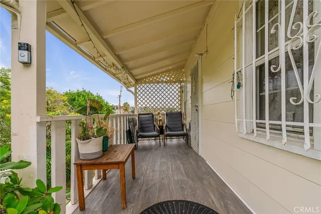 a view of a livingroom with furniture and wooden floor