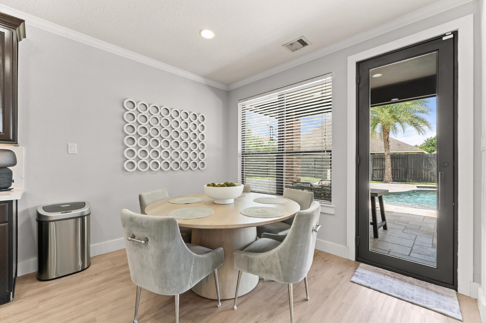 14016 Savannah Landing Lane Rosharon, TX 77583 - Photo 13 of 49 a view of a dining room with furniture window and wooden floor