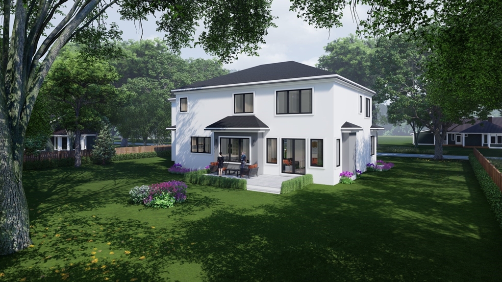 25 Normandy Road Lexington, MA 02421 - Photo 6 of 6 a front view of a house with garden and trees