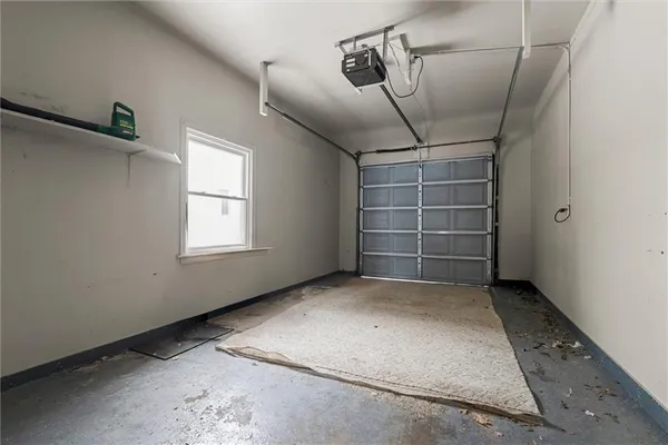 a view of a room with a garage