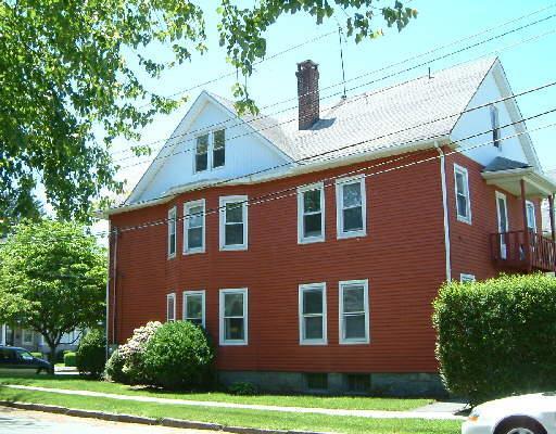 86 Wade Street Bridgeport, CT 06604 - Photo 1 of 1 a front view of a house with garden