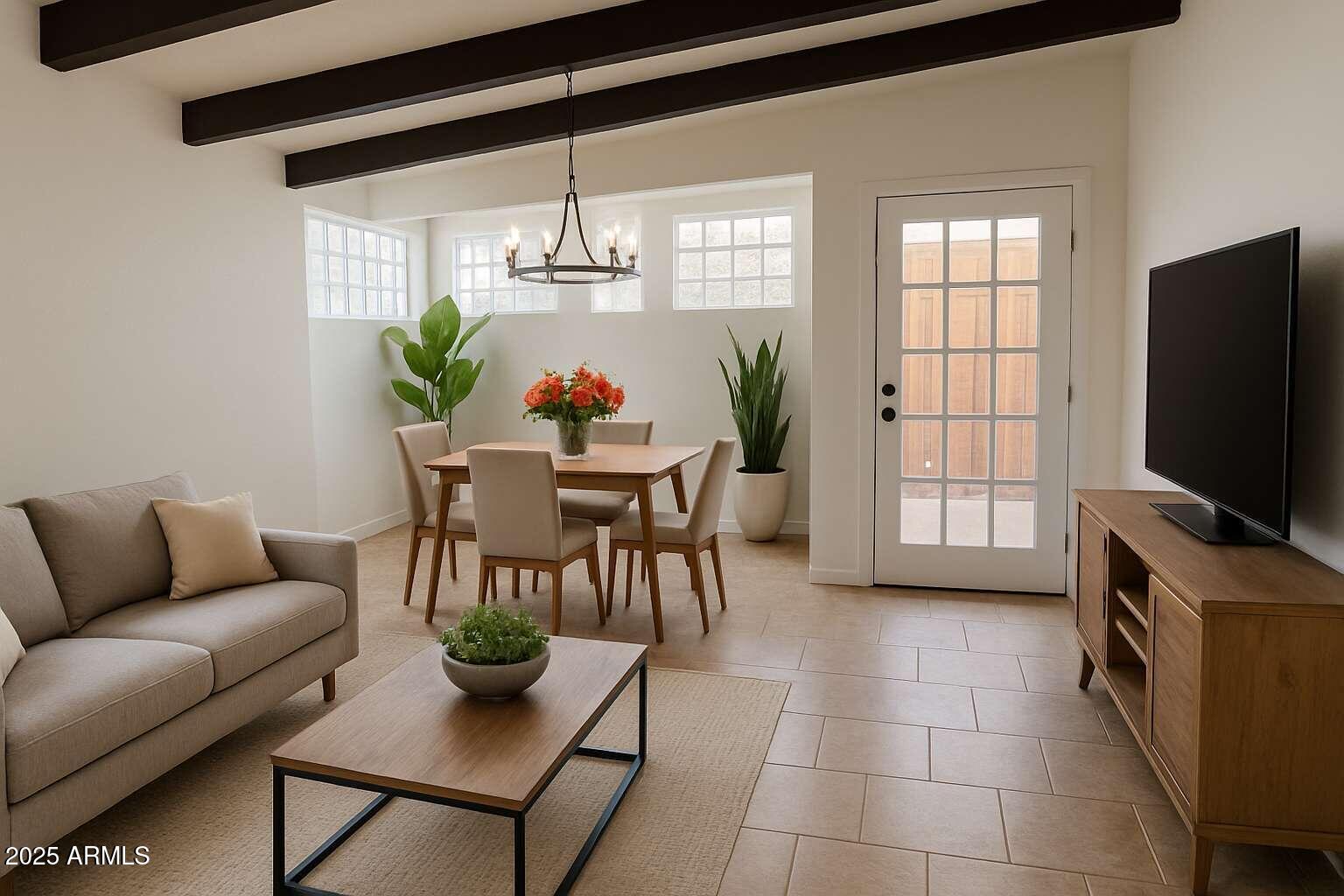 a living room with furniture and a flat screen tv