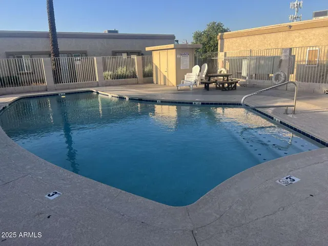 a view of a living room and chandelier