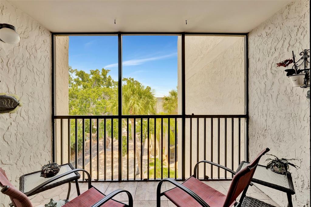6157 Midnight Pass Road, Unit E24 Sarasota, FL 34242 - Photo 10 of 44 a view of a balcony