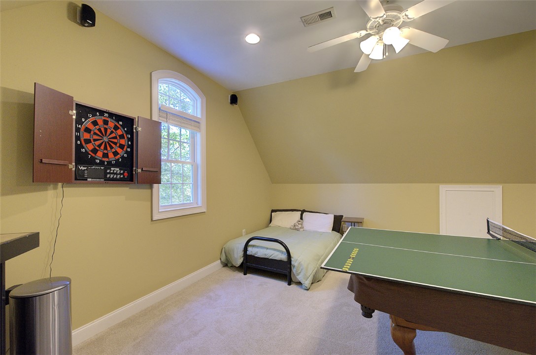100 Turnberry Road Anderson, SC 29621 - Photo 26 of 41 A versatile bonus room awaits, complete with soft carpet and natural illumination.