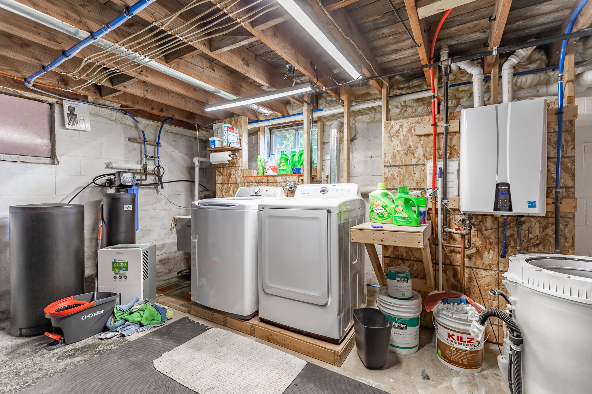 14615 Reeder Road Crown Point, IN 46307 - Photo 16 of 26 a view of a storage room with washer and dryer