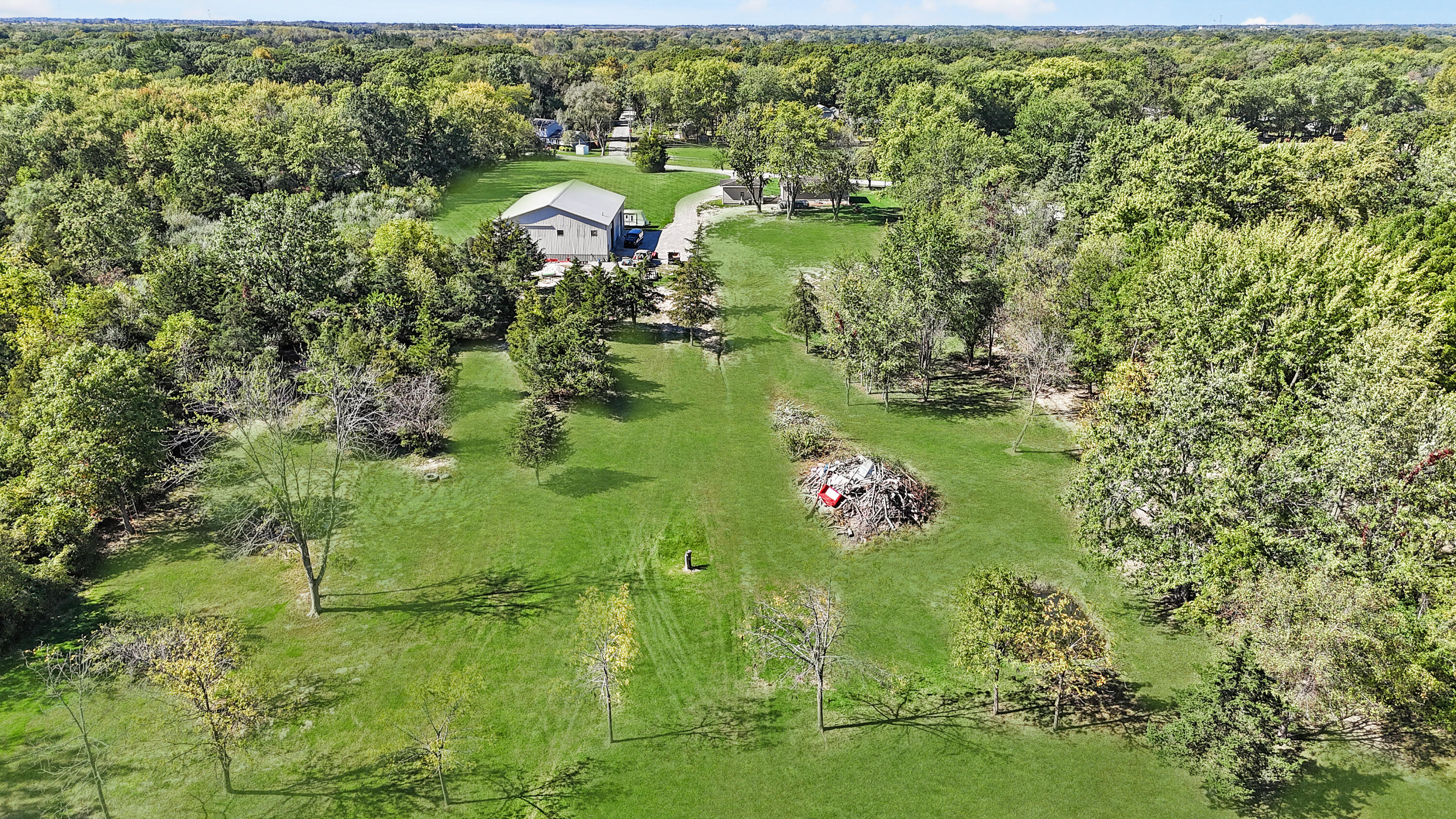 14615 Reeder Road Crown Point, IN 46307 - Photo 3 of 26 a view of a lake with a yard