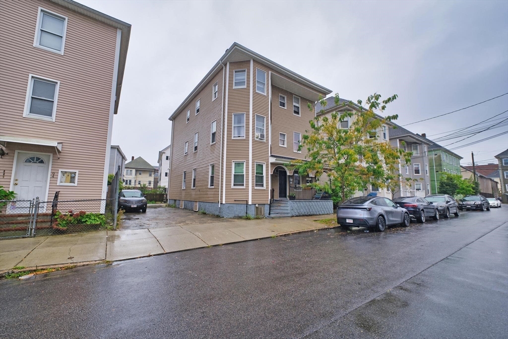 a view of a street with cars