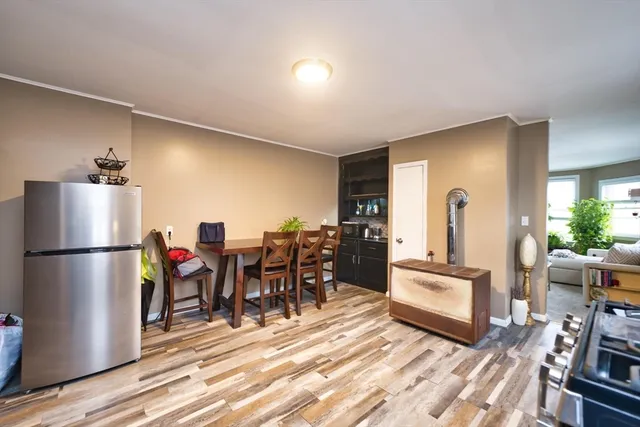 a view of a living room and dining room