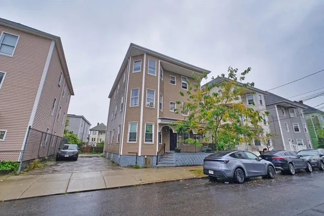 a car parked in front of a building