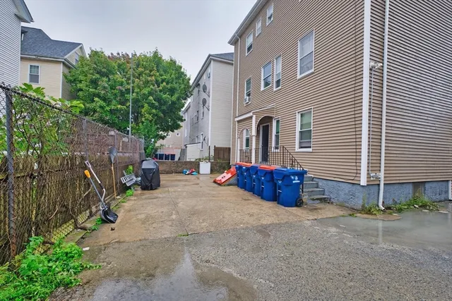 a house view with a backyard space