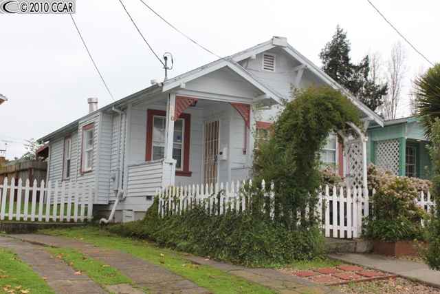 370 Lake Avenue Rodeo, CA 94572 - Photo 1 of 1 a front view of a house with a garden
