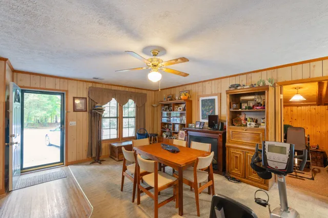 a view of a room with wooden floor and outdoor space