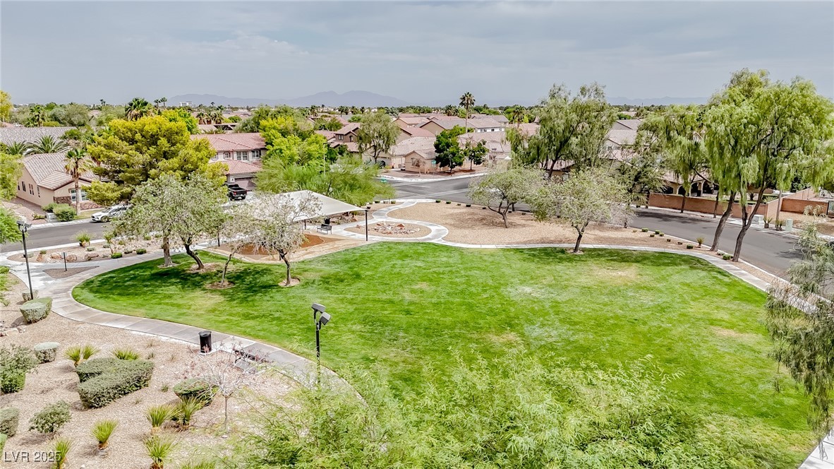 7870 Midnight Ride Street Las Vegas, NV 89131 - Photo 62 of 69 Surrounding community featuring a yard and a residential view