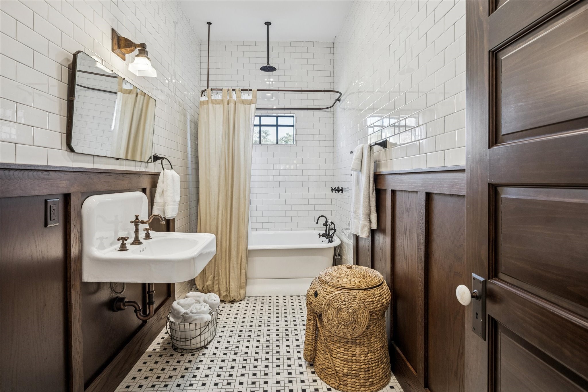 512 Archer Street Houston, TX 77009 - Photo 30 of 40 Charming full bath with classic tile, rain shower head and timeless millwork.