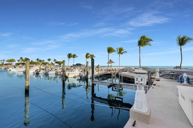 a view of a swimming pool with outdoor seating