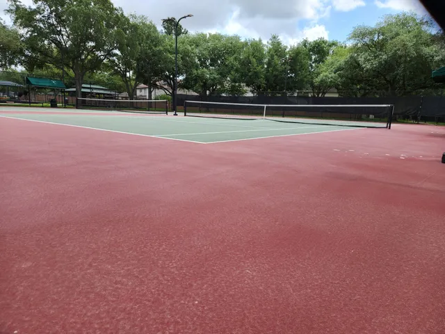 a swimming pool with outdoor seating and yard