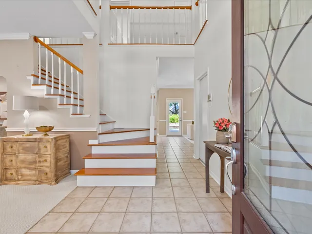 a view of entryway with wooden floor