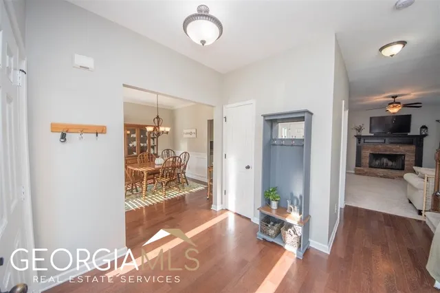 a view of livingroom with furniture and hardwood floor