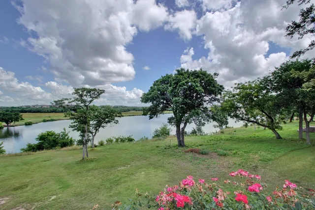a view of a big room with tables and chairs