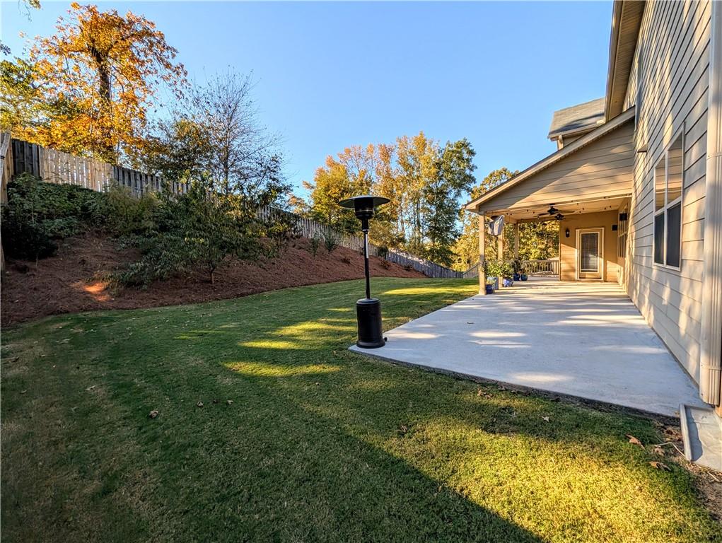 5250 Whisper Point Boulevard Cumming, GA 30028 - Photo 28 of 55 a view of a patio with a yard
