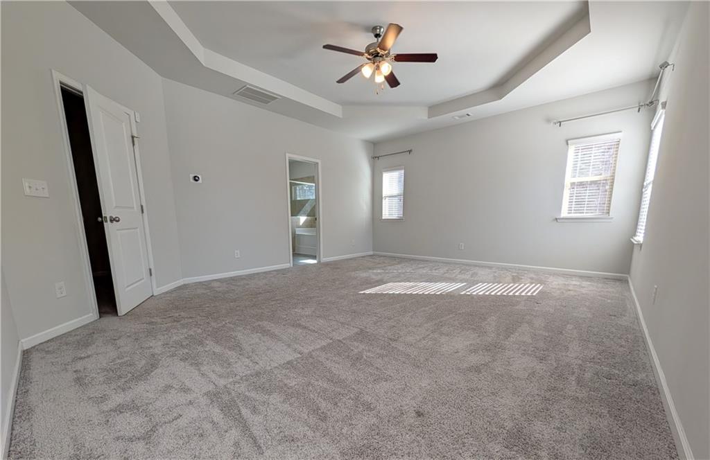 5250 Whisper Point Boulevard Cumming, GA 30028 - Photo 34 of 55 a view of a livingroom with a window