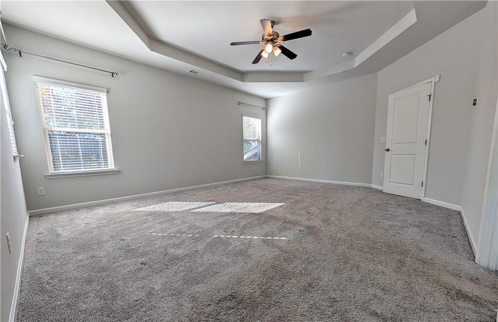5250 Whisper Point Boulevard Cumming, GA 30028 - Photo 36 of 55 a view of empty room with windows