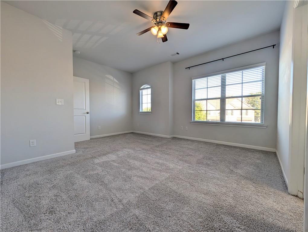 5250 Whisper Point Boulevard Cumming, GA 30028 - Photo 44 of 55 a view of an empty room with a window