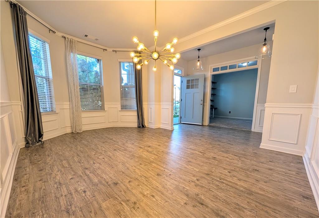 5250 Whisper Point Boulevard Cumming, GA 30028 - Photo 7 of 55 a view of a livingroom with a chandelier