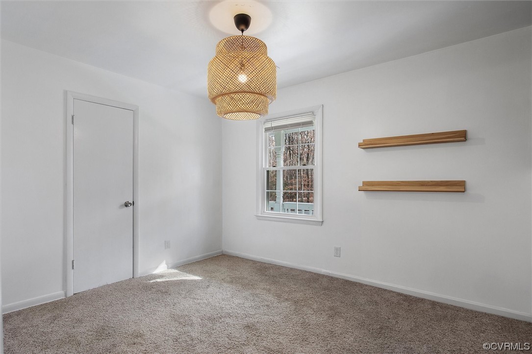 13506 Verdon Road Ruther Glen, VA 22546 - Photo 20 of 27 a view of an empty room with a window