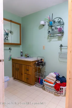 a view of a dinning table and chairs in the backyard