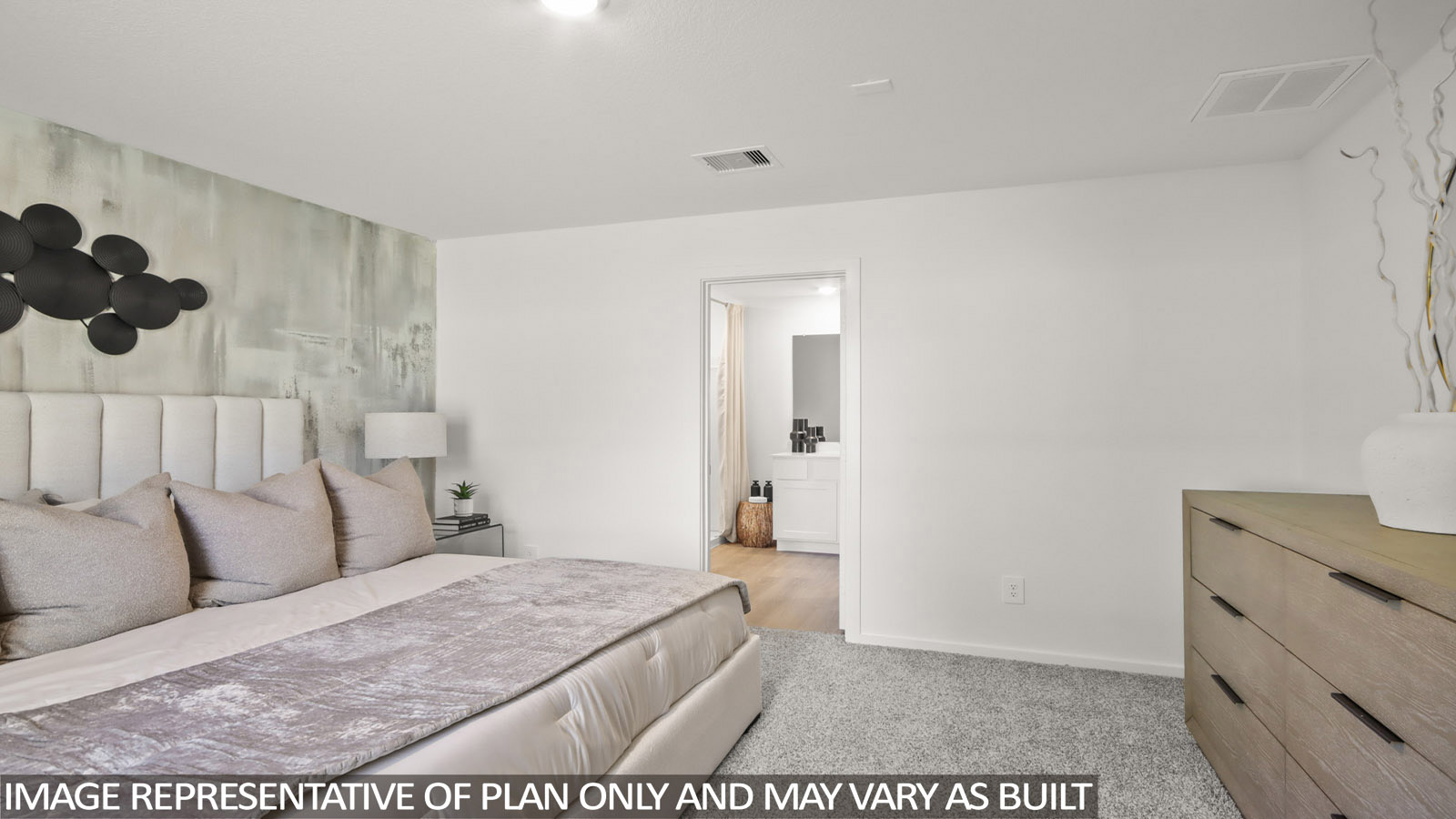 181 Baby Calf Roping Road Jarrell, TX 76537 - Photo 13 of 23 a bedroom with a bed and cabinets