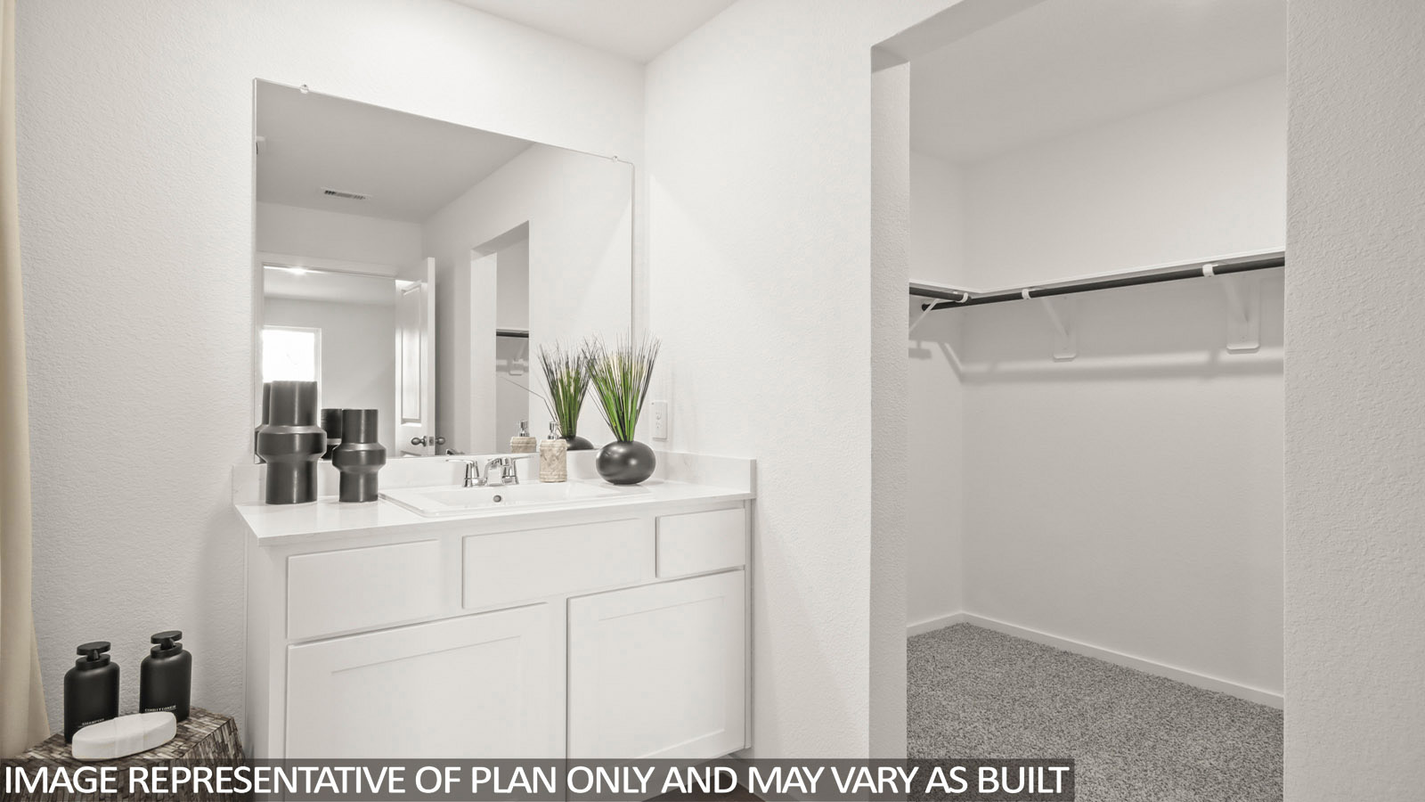 181 Baby Calf Roping Road Jarrell, TX 76537 - Photo 15 of 23 a bathroom with a sink a mirror and shower