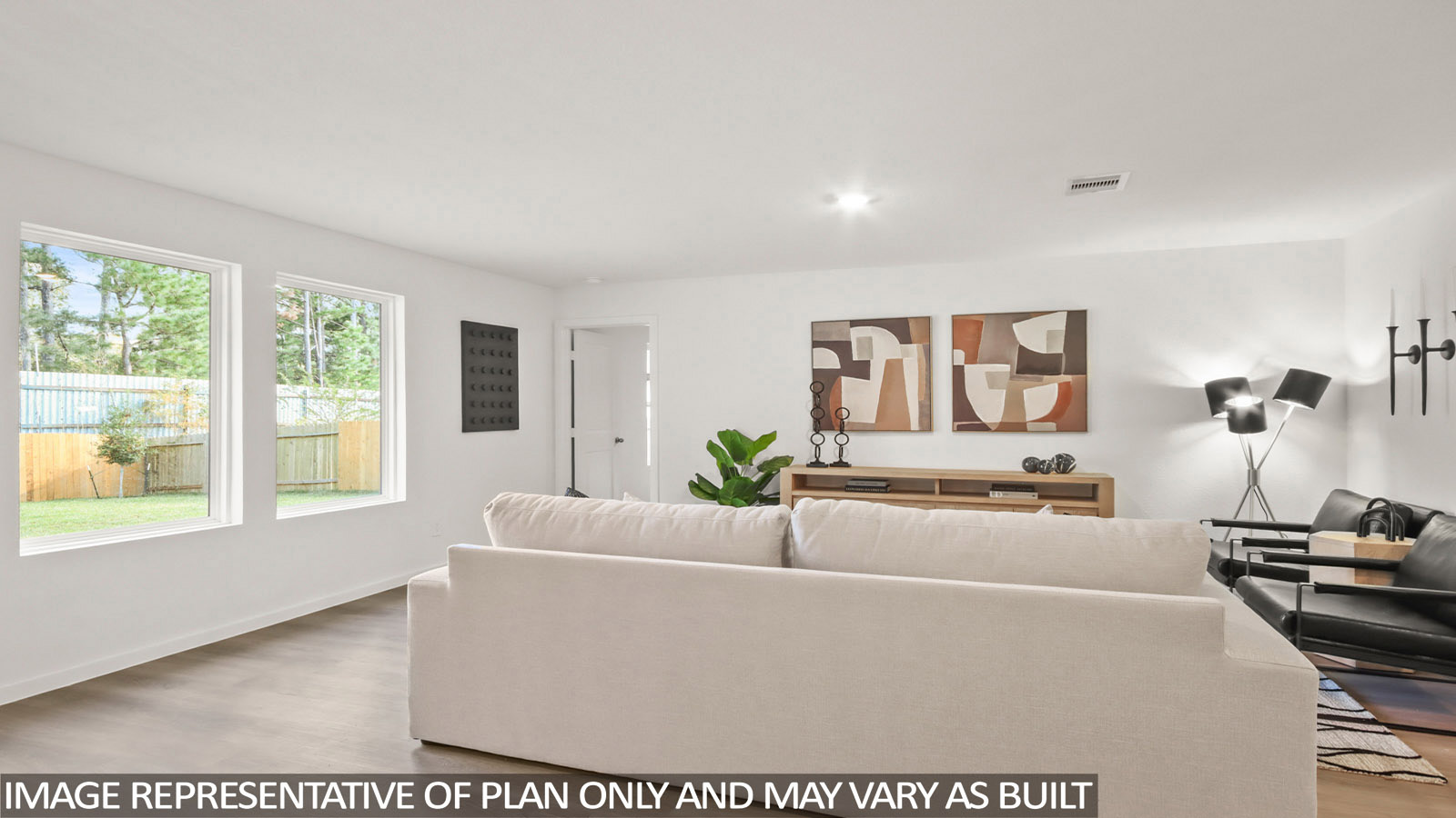 181 Baby Calf Roping Road Jarrell, TX 76537 - Photo 8 of 23 a living room with furniture and a large window