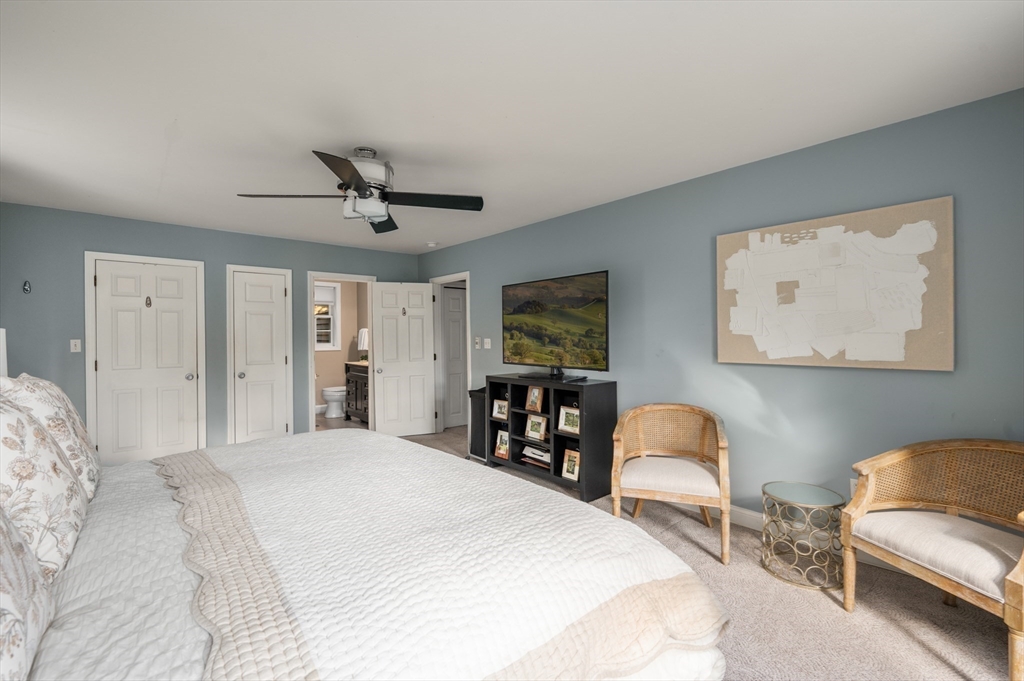 16 Autumn Woods Road Salem, NH 03079 - Photo 18 of 29 a bed room with a bed and a chair