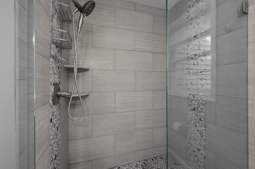 16 Autumn Woods Road Salem, NH 03079 - Photo 20 of 29 a bathroom with a shower