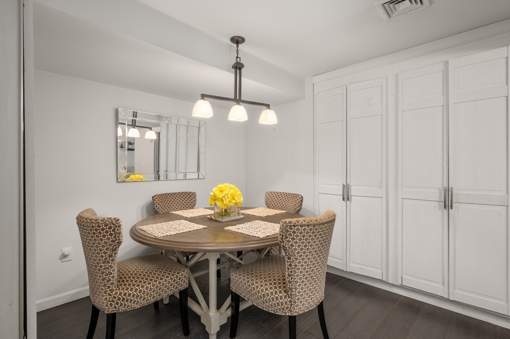 16 Autumn Woods Road Salem, NH 03079 - Photo 23 of 29 a view of a dining room and a table