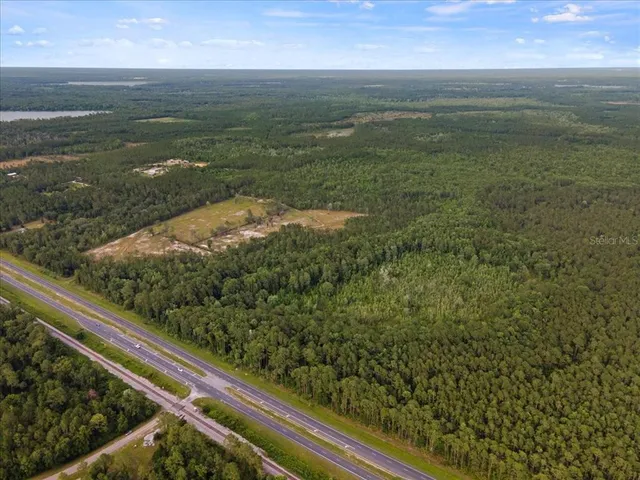 a view of a lake in front of a building