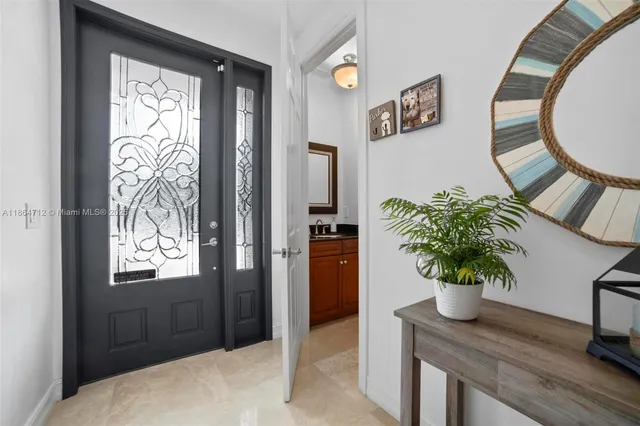 a potted plant sitting on top of a wooden floor