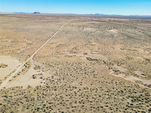 a view of beach and an ocean