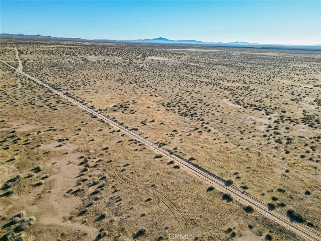 10000 Kramer Station Road Boron, CA 93516 - Photo 3 of 47 a view of a lake view with wooden floor