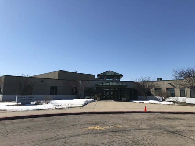 3602 Emerald Road Elgin, IL 60124 - Photo 19 of 36 a view of balcony with two chairs and a table