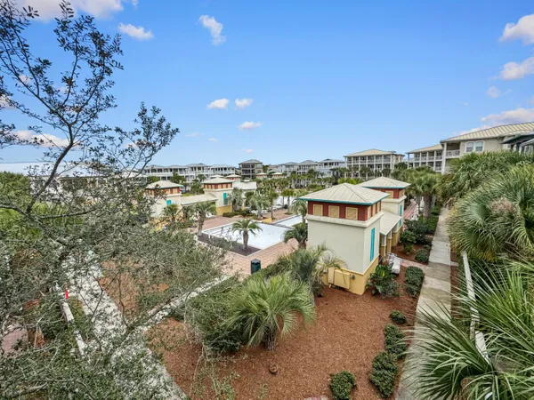 a view of a houses with a yard