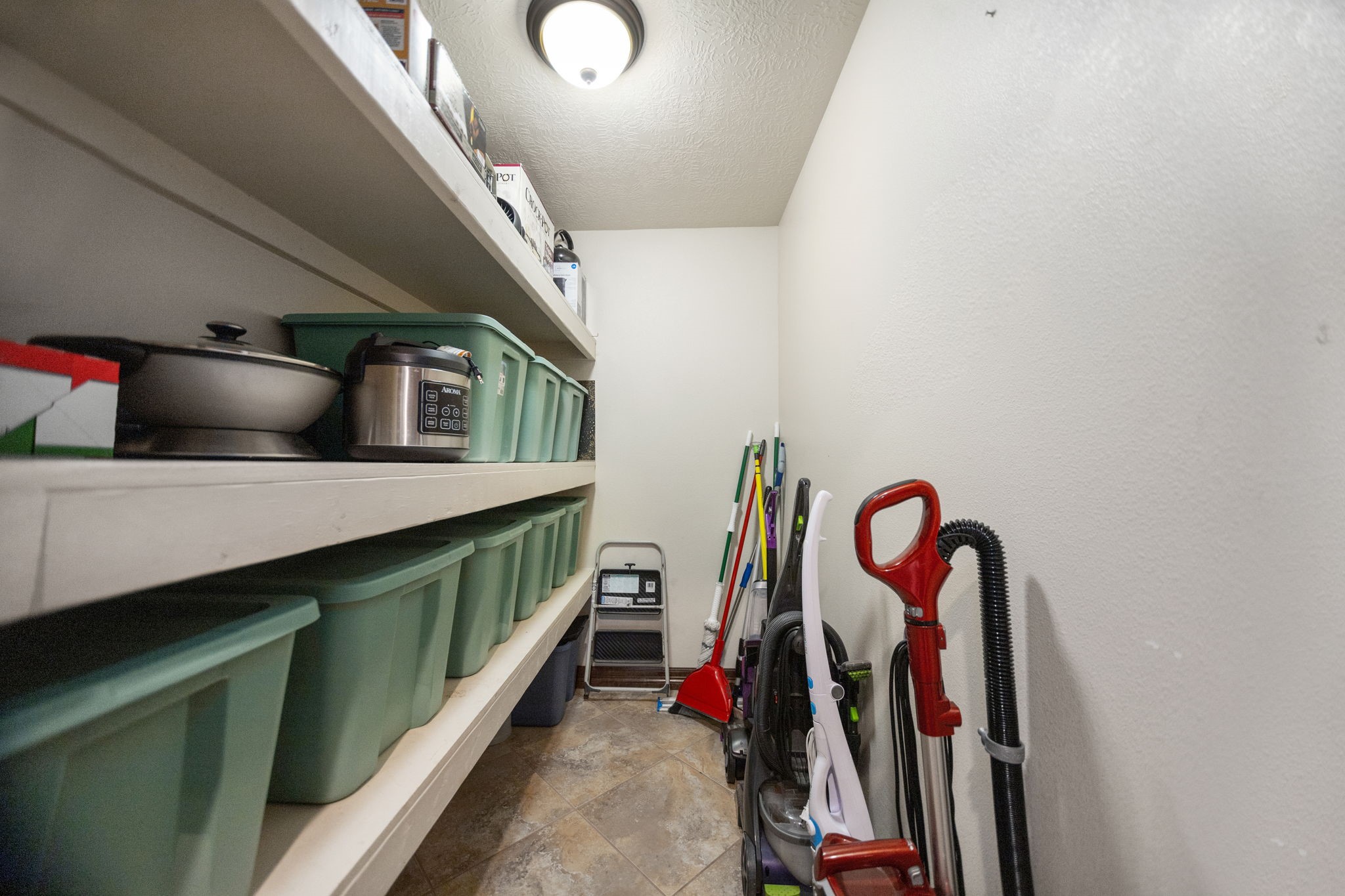 4145 Fm 770 Road Kountze, TX 77625 - Photo 37 of 38 a view of walk in closet with clothes and shoes